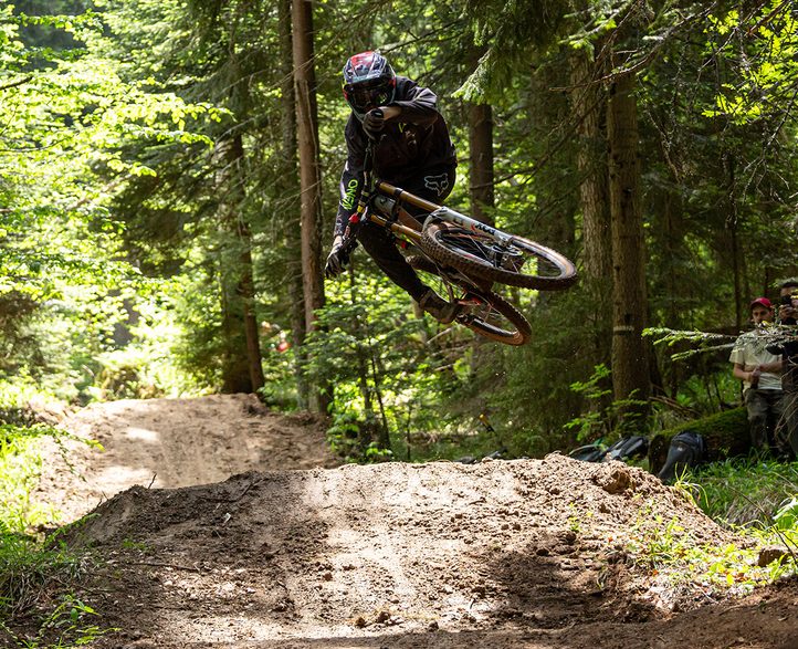 Mountain biker jumping on a Borovets Bike Park trail