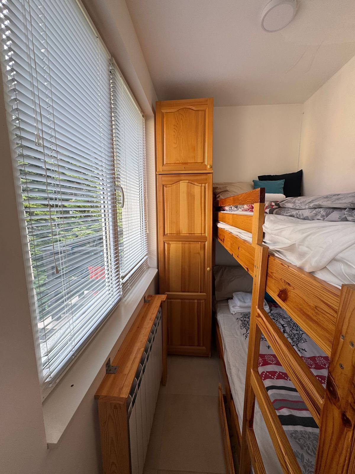 Bunk room with forest view